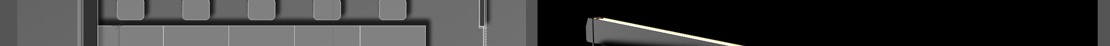 A close-up shot of a modern linear light fixture, featuring a sleek design with a bright, warm light source, set against a dark background.